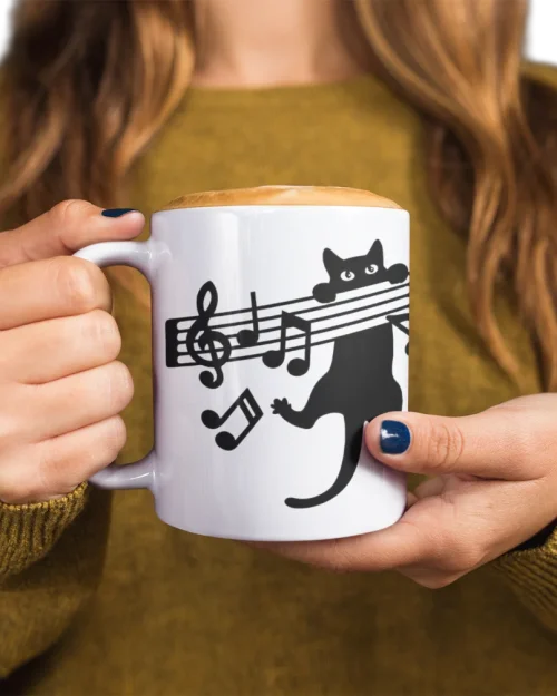 model holding white ceramic mug with void cat design
