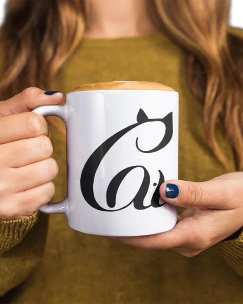 model holding white ceramic mug with void cat design